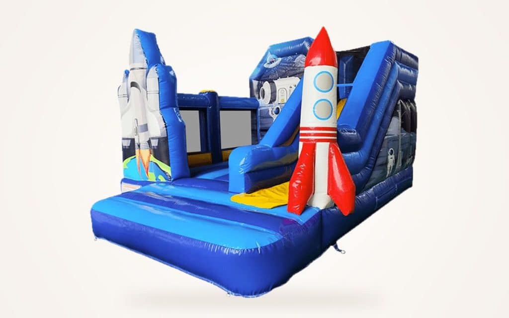 Château gonflable sur le thème de l’espace, avec fusée et toboggan