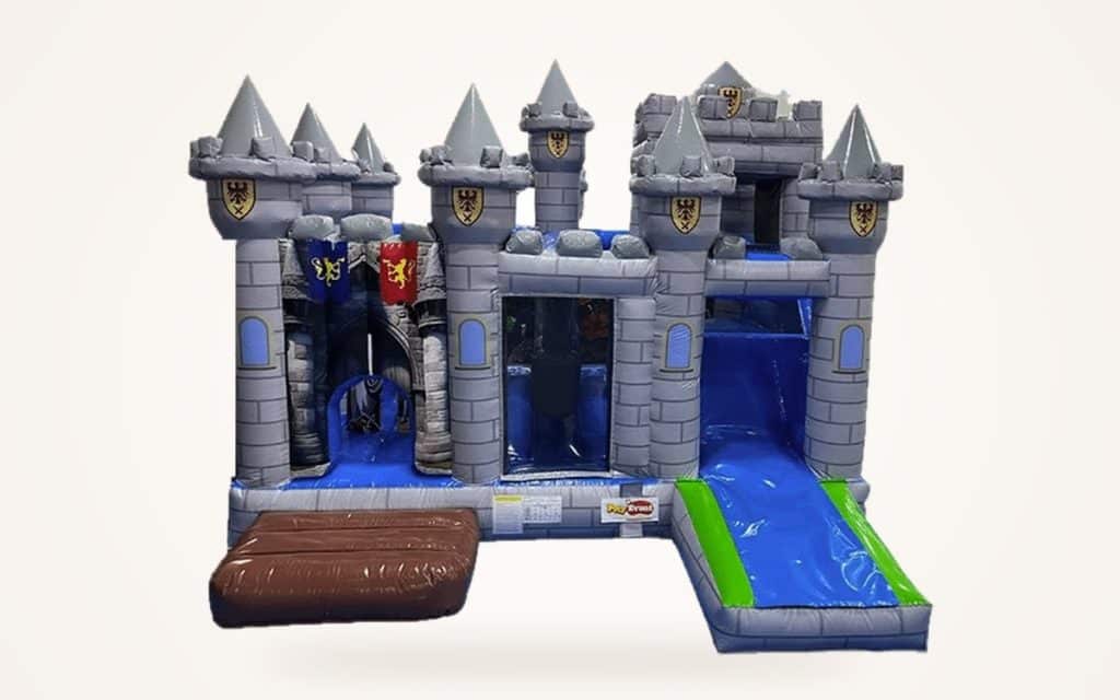 Château gonflable médiéval à tourelles, avec toboggan